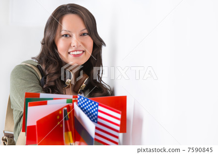 Portrait of a lovely young woman with different countries flags 7590845