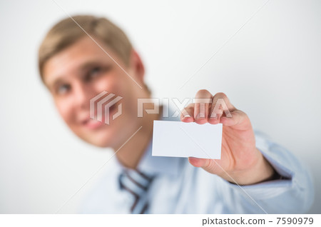 Happy smiling business man showing blank businesscard and dreami Happy smiling business man showing blank businesscard and dreami 7590979