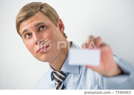 Happy smiling business man showing blank businesscard and dreami 7590983