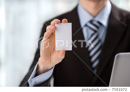 Closeup of torso of confident business man wearing elegant suit Closeup of torso of confident business man wearing elegant suit 7591072
