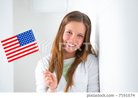 Portrait of a lovely young woman with United States flag smilin Portrait of a lovely young woman with United States flag smilin 7591074