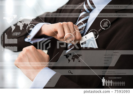 Businessman in luxury suit in front of digital vurtual screen Businessman in luxury suit in front of digital vurtual screen 7591093