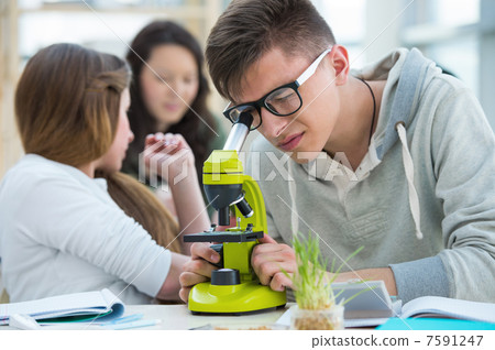 High School students. Group of excited students working in class High School students. Group of excited students working in class 7591247
