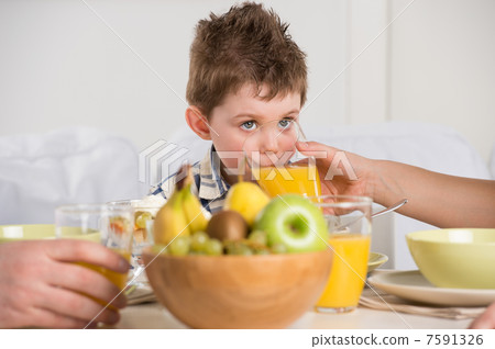 Child on breakfast Child on breakfast 7591326