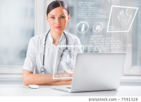 Doctor with hightech computer screen viewing patient data Doctor with hightech computer screen viewing patient data 7591328