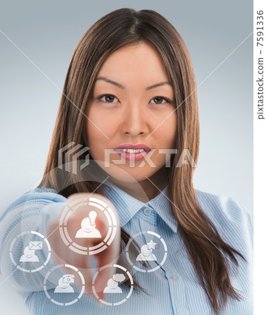 Asian business woman pressing social media icon Asian business woman pressing social media icon 7591336