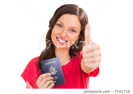 Closeup portrait of young positive woman holding passport and th Closeup portrait of young positive woman holding passport and th 7591716