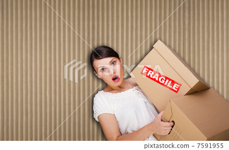 Closeup portrait of a young woman with boxes 7591955