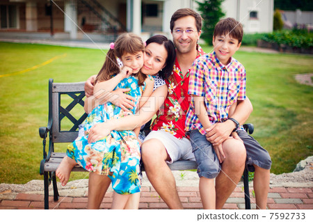 Artistic lifestyle photo of happy family having fun outdoors at Artistic lifestyle photo of happy family having fun outdoors at 7592733