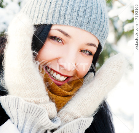 Portrait of young beautiful girl outdoors in winter having fun a Portrait of young beautiful girl outdoors in winter having fun a 7593163