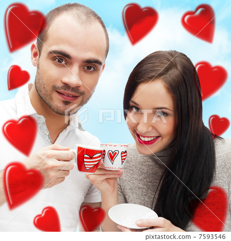 Portrait of young beautiful couple having tea or coffee beverage 7593546