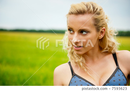 A portrait of a beautiful young Caucasian woman outdoor A portrait of a beautiful young Caucasian woman outdoor 7593623