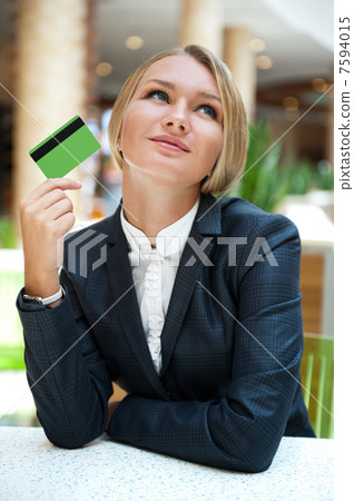 Closeup portrait of cute young business woman smiling while hold 7594015