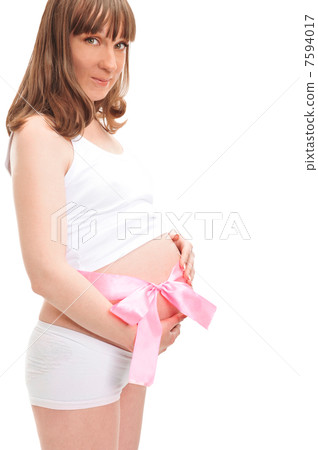 Image of pregnant woman touching her belly with hands 7594017
