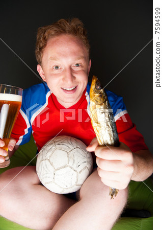 Closeup portrait of young man wearing sportswear fan of football Closeup portrait of young man wearing sportswear fan of football 7594599