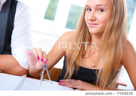 Portrait of college students working indoors looking happy 7594636