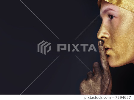 Portrait of young dancing girl with golden body art 7594637