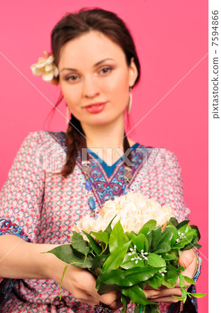 Portrait of a beautiful young girl in Asian clothing. Portrait of a beautiful young girl in Asian clothing. 7594866