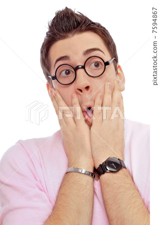 View from front of man in glasses looking at camera with hands o 7594867