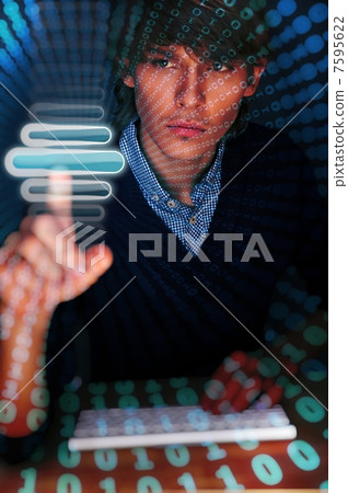 Young business man pressing a touchscreen button while working a 7595622