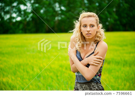 A portrait of a beautiful young Caucasian woman outdoor A portrait of a beautiful young Caucasian woman outdoor 7596661