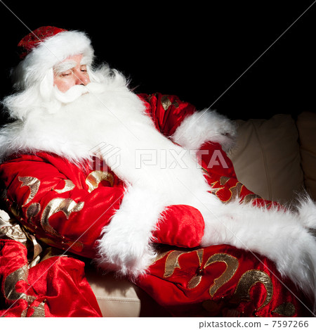 Santa sitting with a sack indoor at dark night room 7597266