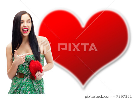 Young happy smiling woman with heart symbol, isolated Young happy smiling woman with heart symbol, isolated 7597331
