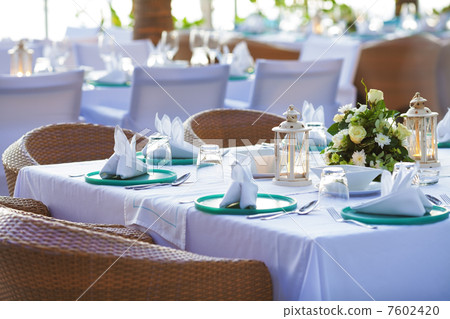 Served table in outdoor restaurant. Shallow depth of field. Served table in outdoor restaurant. Shallow depth of field. 7602420