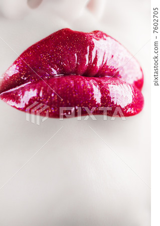 Seductive female lips. Vertical shot. 7602705