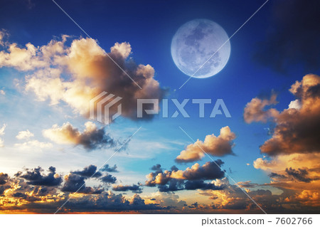Sunset sky with a full moon 7602766