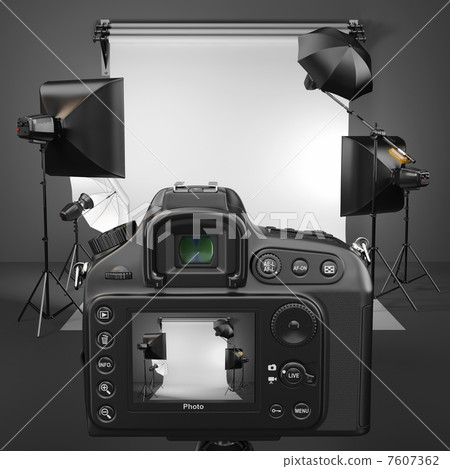 Digital photo camera in studio with softbox and flashes. Digital photo camera in studio with softbox and flashes. 7607362