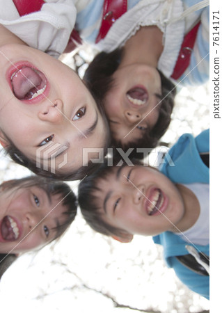 Four elementary school smiles 7614171