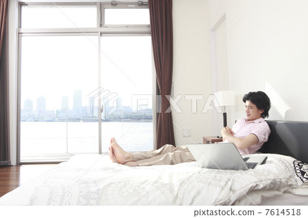 A man thinking on bed A man thinking on bed 7614518