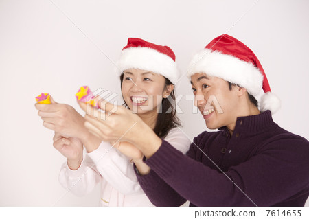 A couple enjoying Christmas party 7614655