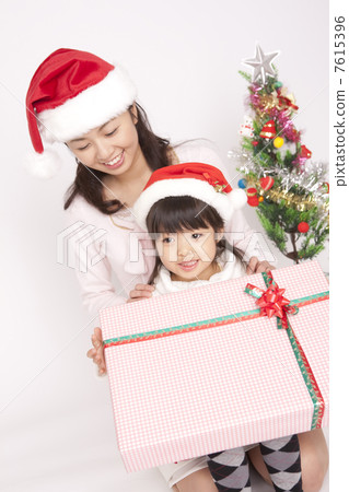 Mother and daughter with gifts Mother and daughter with gifts 7615396