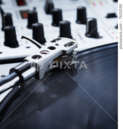 Turntable, vinyl and sound mixer Turntable, vinyl and sound mixer 7628598