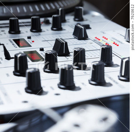 Turntable, vinyl and sound mixer 7628612