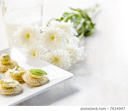 Several canapes and glass of milk Several canapes and glass of milk 7634947
