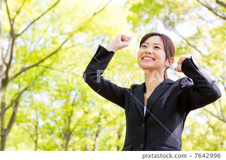 Business woman relaxing in the park Business woman relaxing in the park 7642996