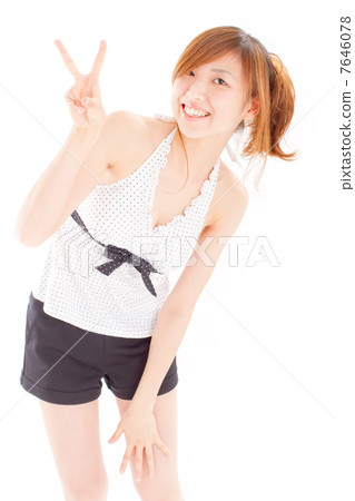 A girl who peacefully signs with a fresh polka dress swimsuit A girl who peacefully signs with a fresh polka dress swimsuit 7646078