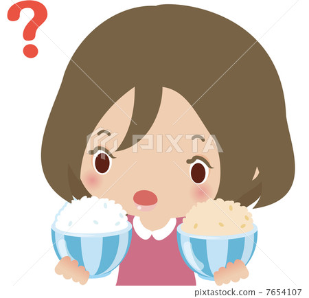 A woman comparing white rice and brown rice A woman comparing white rice and brown rice 7654107