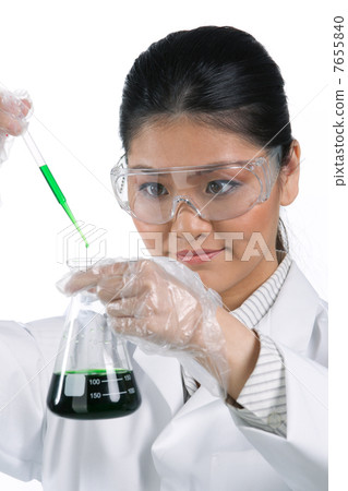 Portrait of scientist analyzing a solution. Portrait of scientist analyzing a solution. 7655840