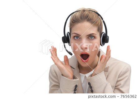 Surprised call center agent with hands raised Surprised call center agent with hands raised 7656362