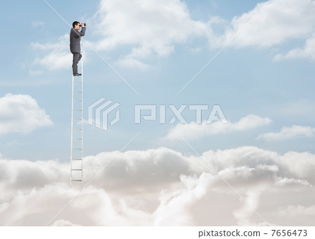 Businessman standing on a ladder over the clouds 7656473