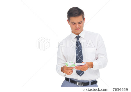 Businessman counting cash 7656639