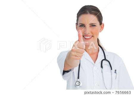 Happy nurse giving thumbs up 7656663