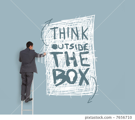 Businessman drawing think outside the box message Businessman drawing think outside the box message 7656710