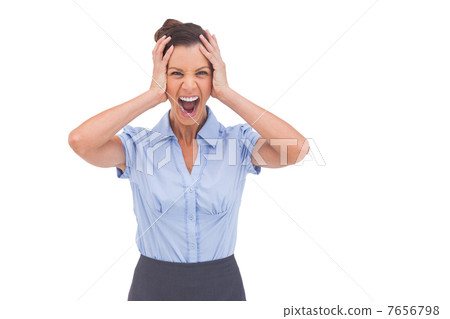 Stressed businessswoman with hand on her head Stressed businessswoman with hand on her head 7656798