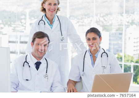 Group of doctors working together Group of doctors working together 7657164