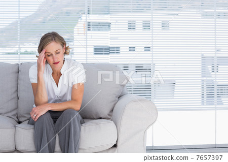 Businesswoman getting headhache 7657397